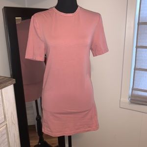 Long tee- fits over your bottom. Cute w leggings!